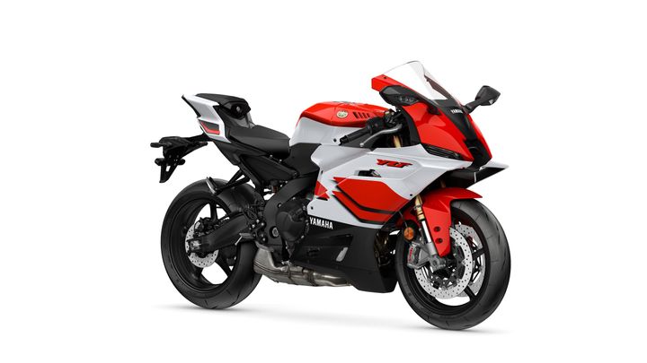 Yamaha 2026 R9 A sleek Yamaha sports motorcycle with a bold red, white, and black design, featuring a sleek fairing, distinctive graphics, and an aerodynamic shape, positioned at a slight angle to highlight its features.