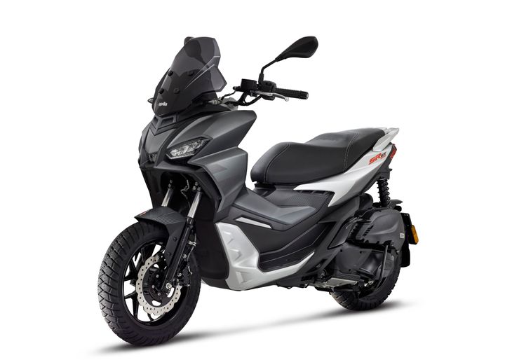 A modern gray scooter with black seats and accents, displayed in a studio setting with a white background.