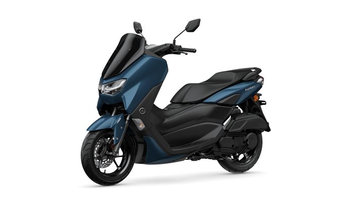 A sleek blue scooter with a modern design, featuring a low seat, a small windshield, and stylish headlights, positioned on a white background.