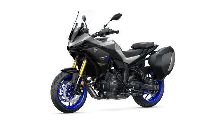 A sleek, modern motorcycle with a gray body, blue wheels, and a spacious black luggage compartment on the rear, positioned on a white background.