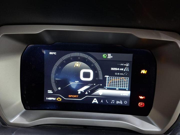 Digital dashboard display showing speedometer at 0 mph, RPM at 149, temperature at 20°C, trip distance of 3254 miles, and a gear indicator in sport mode.