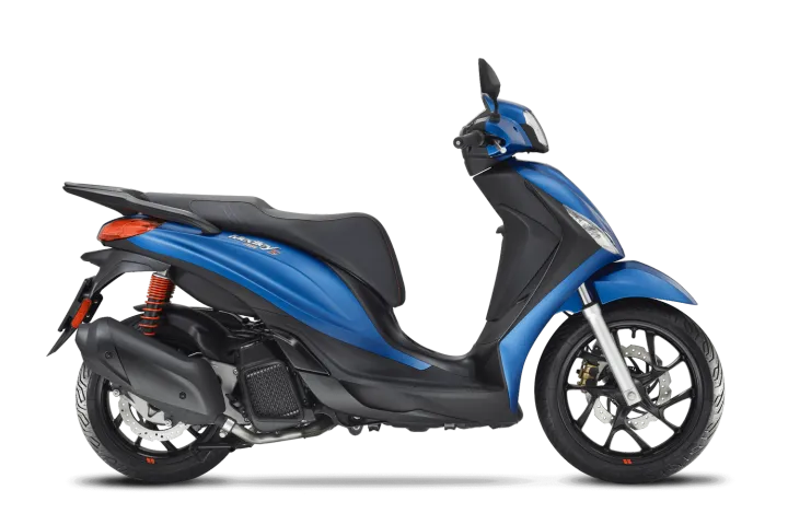 A sleek blue scooter viewed from the side, showcasing its modern design, comfortable seat, and rear suspension.