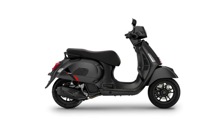 A sleek black scooter with modern design features, including a comfortable seat and stylish wheels, shown from the side against a white background.