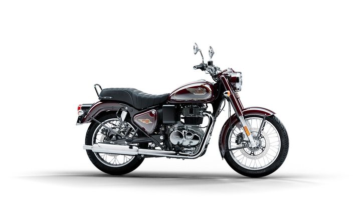 A classic Royal Enfield motorcycle in maroon and black colors parked against a white background.