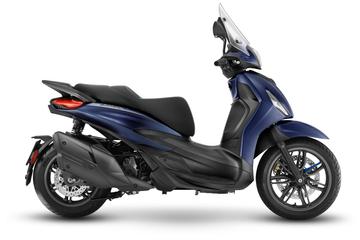 A blue scooter with a sleek design, featuring a windscreen, comfortable seat, and dual-tone bodywork. The side view highlights the scooter's curves, rear suspension, and distinct wheel.
