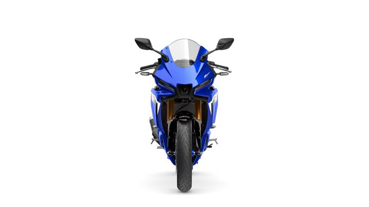 Front view of a blue Yamaha sports motorcycle with a sleek design, featuring a prominent windshield and visible branding.