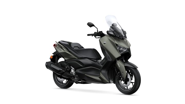 A sleek, modern scooter in an olive green color, featuring a large windshield, comfortable seat, and sporty design elements.