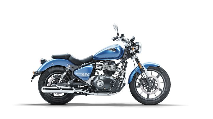 A blue motorcycle with chrome finishes and labeled "650" on the side, positioned at a slight angle to the viewer against a white background.