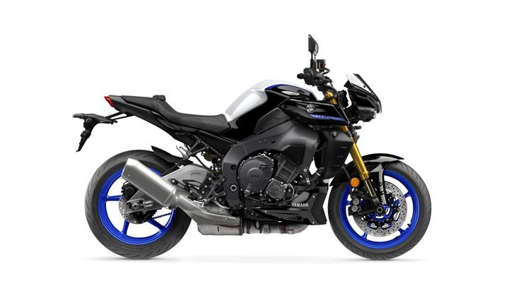 A black and silver Yamaha motorcycle with blue wheels and gold front forks, viewed from the side against a white background.