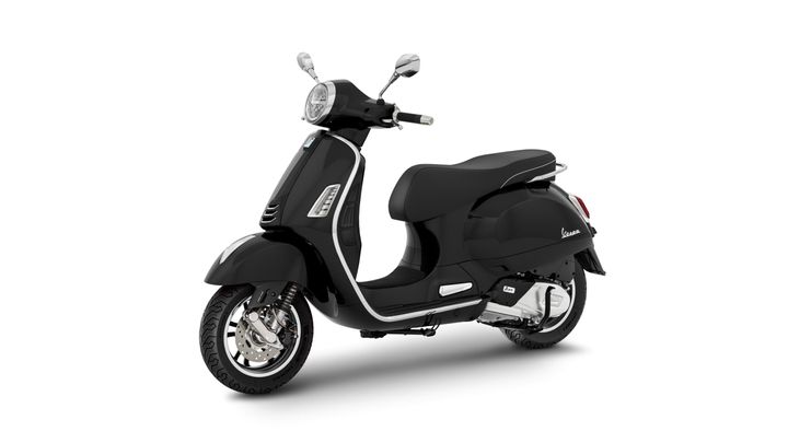 A sleek black scooter with chrome accents and a comfortable seat, shown from a slight angle, highlighting its design and features.