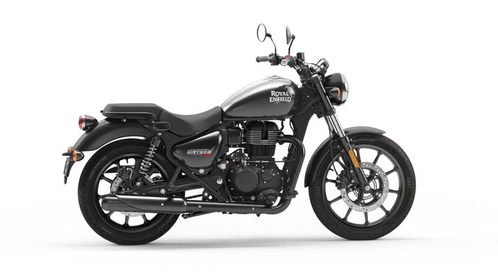 A Royal Enfield Meteor motorcycle with a black and silver color scheme on a white background.