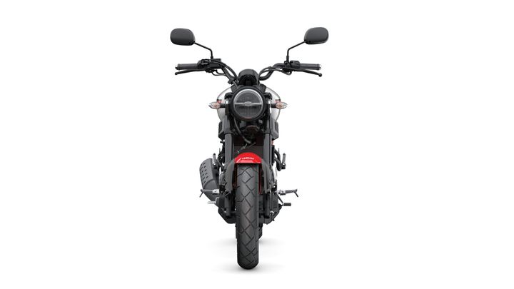A front view of a modern motorcycle featuring a circular headlight, handlebars with rearview mirrors, and a prominent rear tire, set against a white background.
