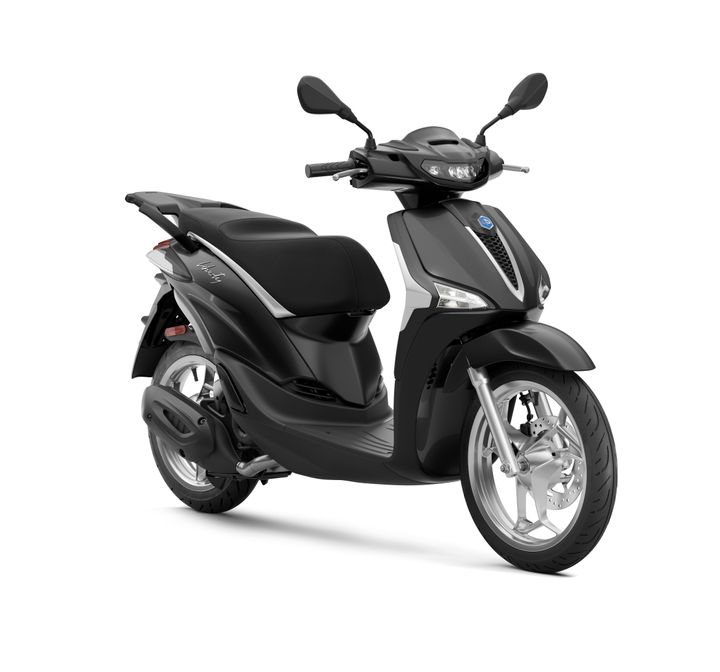 A sleek black scooter with a streamlined design, featuring a comfortable seat, dual mirrors, and modern headlights, positioned at a slight angle against a white background.