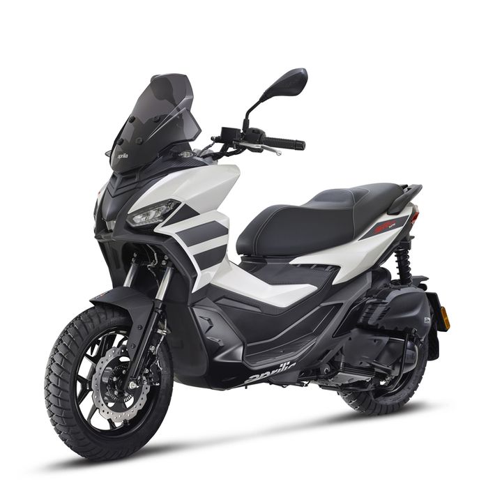 A modern scooter in glossy black and white, featuring a large windscreen, sporty design accents, and a comfortable seat.