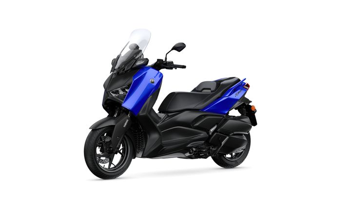 A blue and black scooter, featuring a sporty design, windscreen, and a comfortable seat, displayed at an angle on a white background.