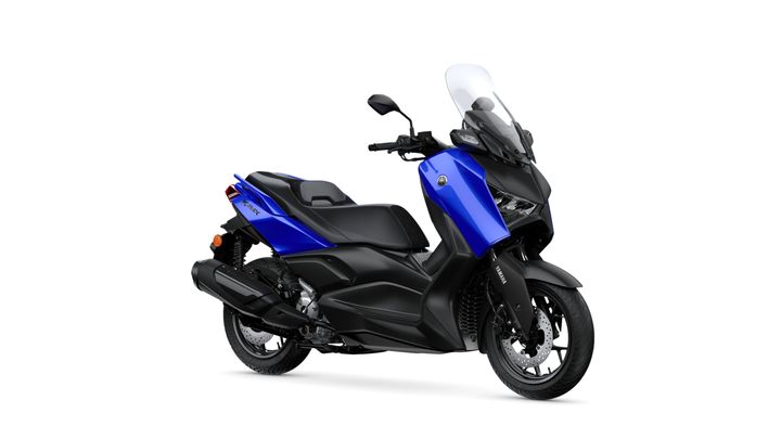 Yamaha 2026 XMAX 300 A blue and black Yamaha XMAX scooter positioned at an angle, showcasing its sleek design, front windshield, and modern features against a white background.
