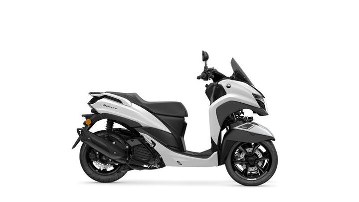 A sleek, modern white and black scooter parked on a plain background.