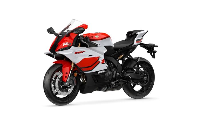 A red and white Yamaha YZF-R9 motorcycle displayed at an angle, showcasing its sleek design and sporty features.