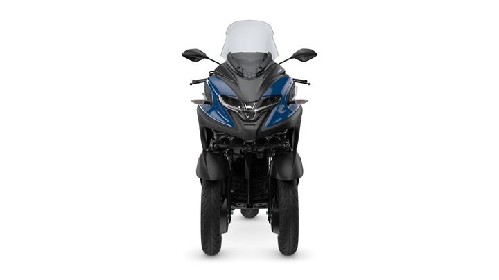 A front view of a modern blue and black motorcycle with two front wheels and a windshield.