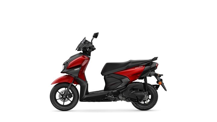 A modern red and black Yamaha scooter shown from a side angle, featuring a sleek design, front windshield, and sporty wheels.