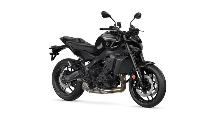 A sleek black motorcycle with a modern design, showcasing a prominent front headlight, dual disc brakes, and a low seat, captured from the right side against a white background.