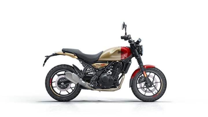 A modern motorcycle with a red fuel tank, beige saddle, and black engine showcased against a white background.