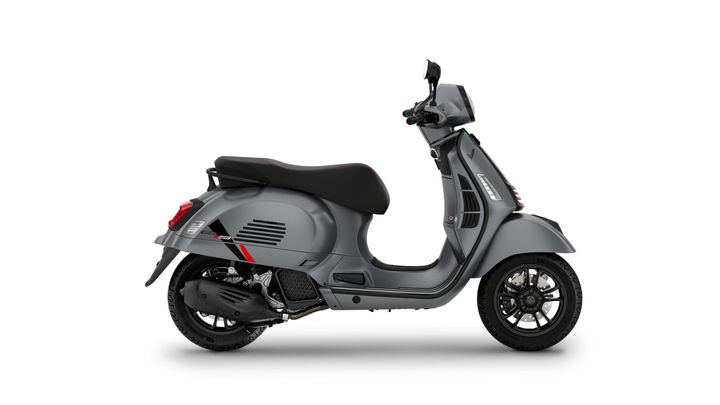 A sleek gray scooter with a black seat, showcasing a modern design, side profile view.