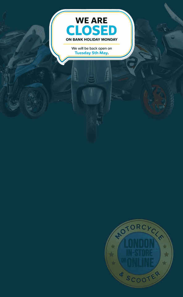 Image featuring several scooters and motorcycles with a prominent text overlay stating "WE ARE CLOSED ON BANK HOLIDAY MONDAY. We will be back open on Tuesday 5th May." A round badge at the bottom reads "MOTORCYCLE LONDON IN-STORE OR ONLINE."