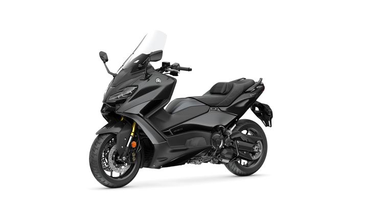 A sleek black Yamaha TMAX scooter, featuring a modern design, large windshield, and sporty elements, positioned on a plain white background.