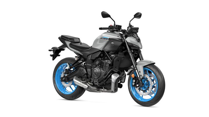 A gray Yamaha MT-07 motorcycle with blue wheels is displayed against a white background, showcasing its sleek design and sporty features.