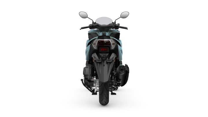 A rear view of a modern motorcycle featuring a sleek design, dual mirrors, and a prominent exhaust system, set against a plain white background.