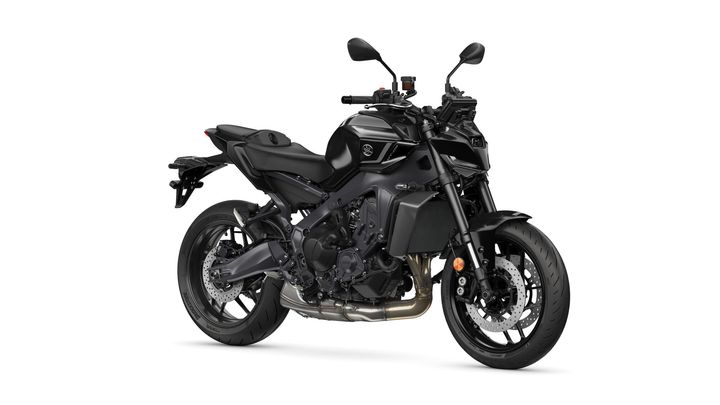 Yamaha 2024 MT-09 Y-AMT A sleek black motorcycle with a modern design, showcasing an exposed engine, sporty frame, and dual disc brakes. The bike features a low-profile seat and is positioned at a slight angle, highlighting its aggressive stance.