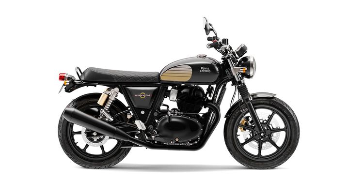 A Royal Enfield Interceptor motorcycle in black and gold colors, displayed side-on against a white background.