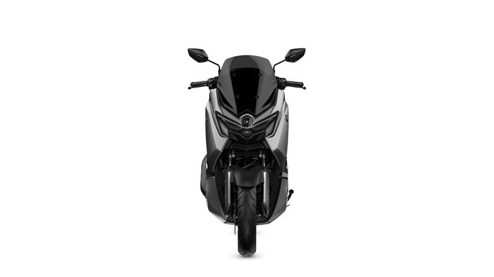 A sleek, modern motorcycle viewed head-on, featuring a black and silver design, prominent headlights, and a sturdy front wheel.