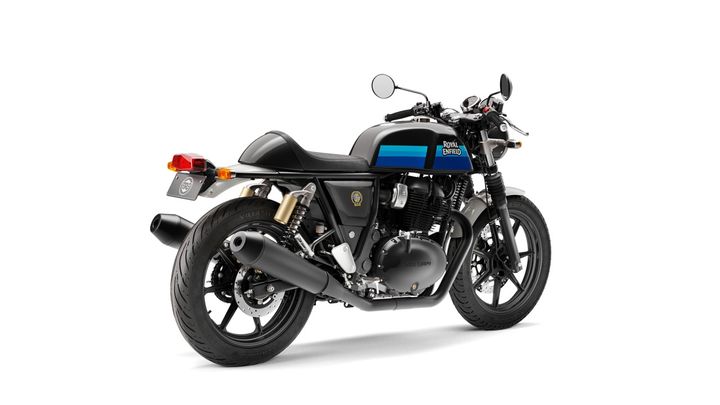 A Royal Enfield motorcycle with a black and blue color scheme, displayed in a studio setting with a white background.