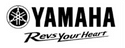 Yamaha logo featuring the word "Yamaha" in bold black letters above the tagline "Revs Your Heart" in a stylized font, alongside a circular emblem with a three-pronged design.