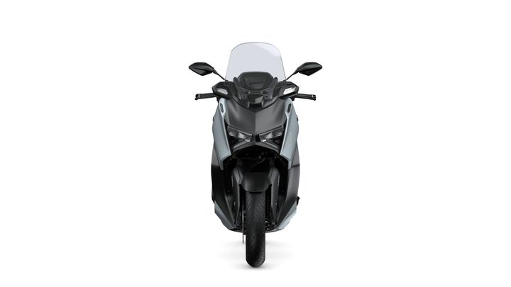 Front view of a modern, sleek scooter with a dark frame and a transparent windscreen, showcasing its aggressive headlight design and smooth lines.