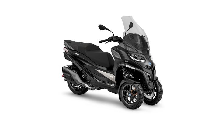 A modern three-wheeled motor scooter in black and gray colors, displayed in a clear white background.