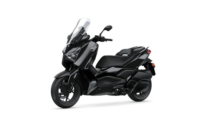 A black Yamaha scooter with a sleek design, featuring a windscreen, comfortable seating, and stylish bodywork, positioned at a slight angle against a white background.