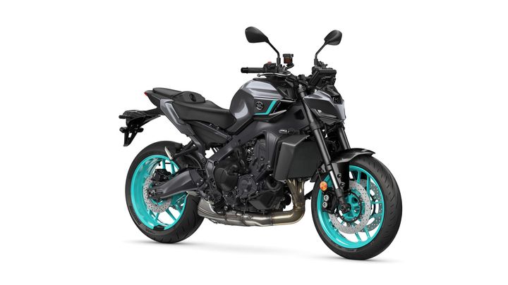 A sleek black motorcycle with turquoise accents, featuring a muscular design, upright handlebars, and distinctive wheels, positioned on a white background.