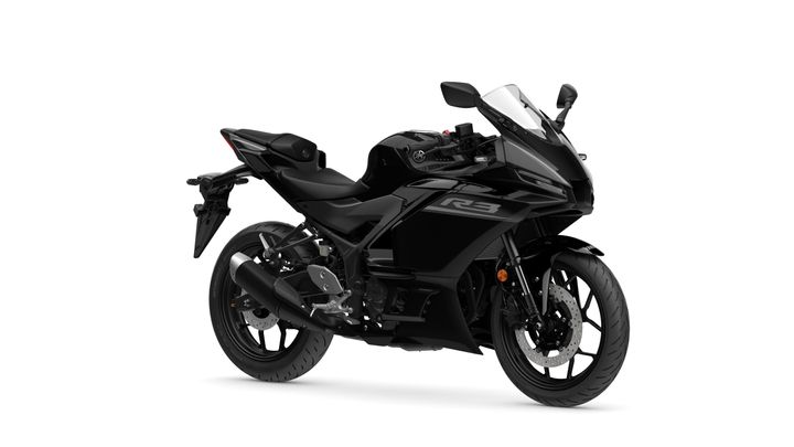 Yamaha 2026 R3 A sleek black Yamaha R3 motorcycle positioned at a slight angle, showcasing its aerodynamic body, sport seat, and dual headlights against a plain white background.