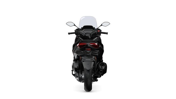 A black motorcycle viewed from the rear, featuring a transparent windscreen, two side mirrors, and distinctive tail lights.