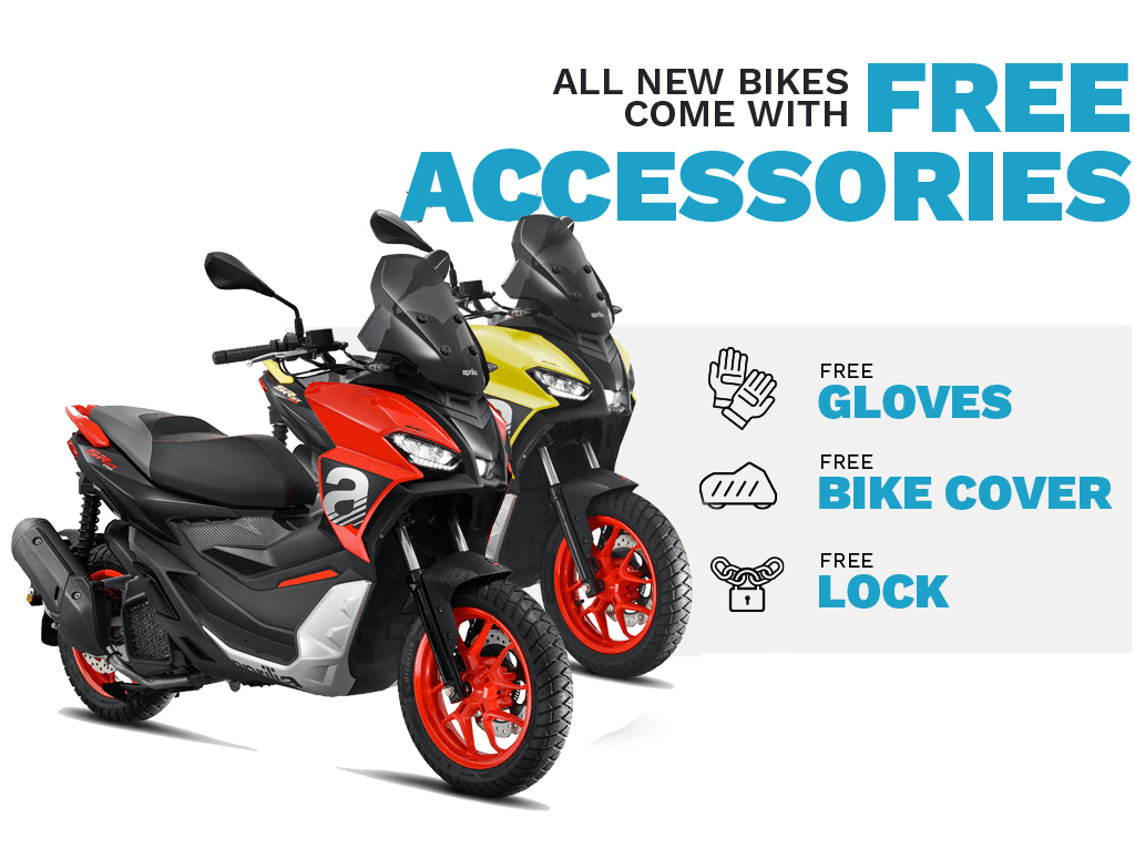 Promotional image featuring two new motorcycles in red and yellow with text "ALL NEW BIKES FREE ACCESSORIES" and icons indicating free gloves, bike cover, and lock.