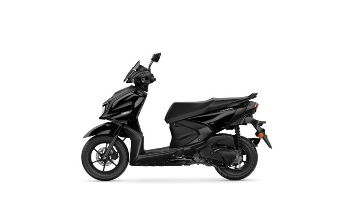 A black Yamaha scooter displayed from the side, showcasing its sleek design, front headlight, and rear wheel. The background is white, emphasizing the scooter's features.